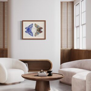 Motyle kolorowe w ramie wiszące w salonie