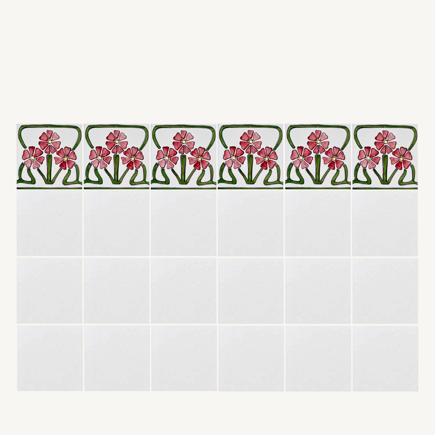 ściana białych kafli zwieńczonych linią kolorowej bordiury z wzorem w czerwone kwiaty